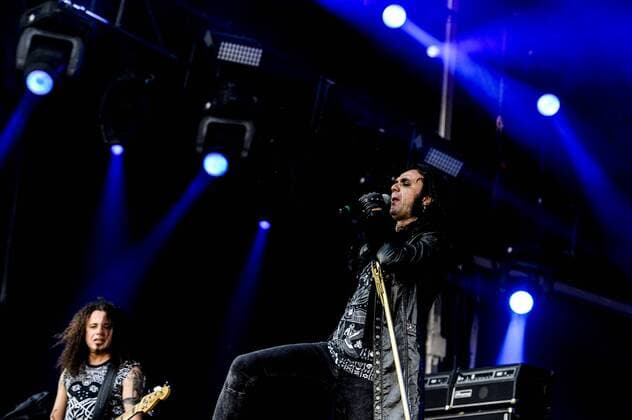 RIO DE JANEIRO, Brazil - 09 25 2015: ROCK IN RIO 2015 - The MOONSPELL + DERRICK GREEN Band performs at Sunset Stage on five days of the festival, during Rock in Rio 2015.  MarceloxCortes