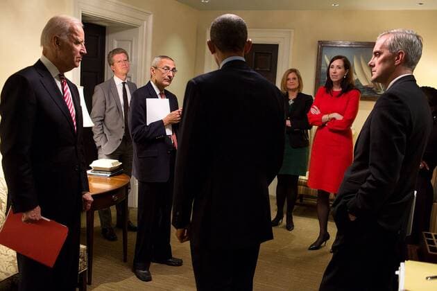 Nov. 7, 2014 - Washington, DC, United States of America - U.S. President Barack Obama talks with, from left, Vice President Joe Biden; Shaun Donovan, Director, Office of Management and Budget; John Podesta, Counselor to the President; Jennifer Palmieri, Director of Communications; Katie Beirne Fallon, Director of Legislative Affairs; National Security Advisor Susan E. Rice and Chief of Staff Denis McDonough, in a West Wing hallway of the White House November 7, 2014 in Washington, DC. Washington United States of America - ZUMAp138