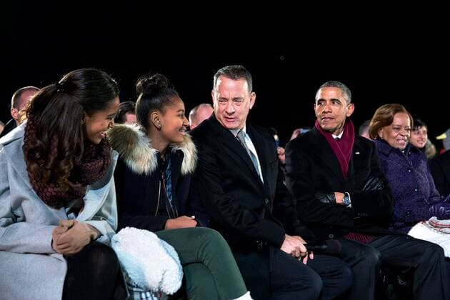 Dec. 4, 2014 - Washington, DC, United States of America - Actor Tom Hanks jokes with Malia and Sasha as President Barack Obama looks on at the National Christmas Tree lighting ceremony on the Ellipse December 4, 2014 in Washington, D.C. Washington United States of America - ZUMAp138