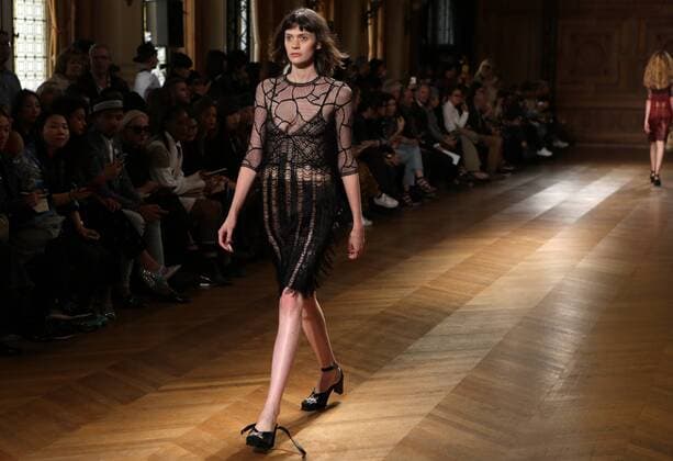A model takes to the catwalk during the presentation of Sharon Wauchob s collection as part of the 2016 Spring-Summer ready-to-wear Fashion Week in Paris, on September 30, 2015.  PAR20150930102 MAYAxVIDON-WHITE