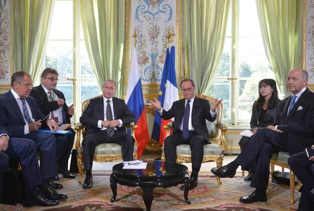 PARIS, FRANCE. OCTOBER 2, 2015. Russian President Vladimir Putin (3rd L) and French President Francois Hollande (3rd R) hold a bilateral meeting ahead of Ukraine peace talks at the Elysee Palace in Paris. Pictured L is Russia s Foreign Minister Sergei Lavrov. Alexei Druzhinin Russian Presidential Press and Information Office TASS  TS00EE60