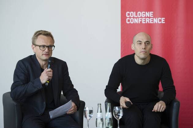von links: Hajo SCHOMERUS, Deutschland, Kameramann und Regisseur, Joshua OPPENHEIMER, USA, Regisseur, Werkstattgespraeche im Rahmen der Cologne Conference in Koeln, 01.10.2015.