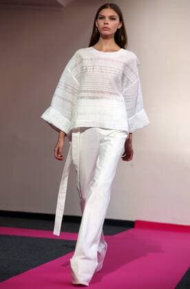 A model takes to the catwalk during the presentation of Diogo Miranda s collection as part of the 2016 Spring-Summer ready-to-wear Fashion Week in Paris, on October 3, 2015.  PAR20151003115 MAYAxVIDON-WHITE