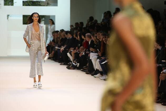 A model takes to the catwalk during the presentation of Akris collection as part of the 2016 Spring-Summer ready-to-wear Fashion Week in Paris, on October 4, 2015.  PAR20151004114 MAYAxVIDON-WHITE