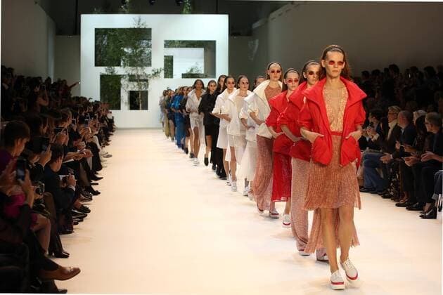 A model takes to the catwalk during the presentation of Akris collection as part of the 2016 Spring-Summer ready-to-wear Fashion Week in Paris, on October 4, 2015.  PAR20151004101 MAYAxVIDON-WHITE