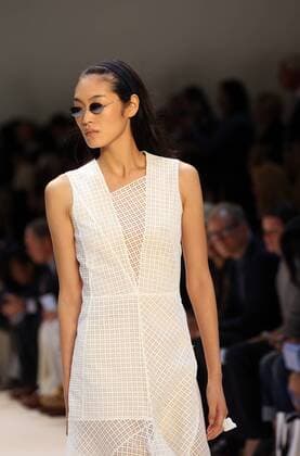 A model takes to the catwalk during the presentation of Akris collection as part of the 2016 Spring-Summer ready-to-wear Fashion Week in Paris, on October 4, 2015.  PAR20151004104 MAYAxVIDON-WHITE