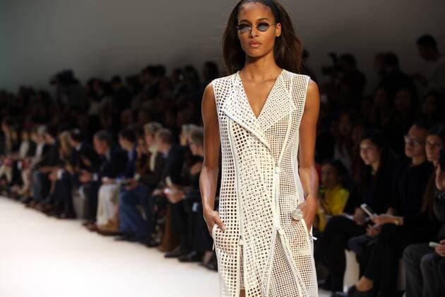 A model takes to the catwalk during the presentation of Akris collection as part of the 2016 Spring-Summer ready-to-wear Fashion Week in Paris, on October 4, 2015.  PAR20151004106 MAYAxVIDON-WHITE