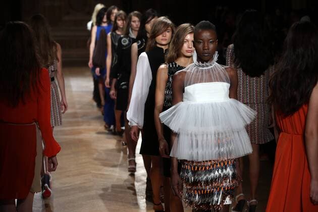 Models line up at the end of the presentation of his Yde s collection as part of the 2016 Spring-Summer ready-to-wear Fashion Week in Paris, on October 7, 2015.  PAR20151007102 MAYAxVIDON-WHITE