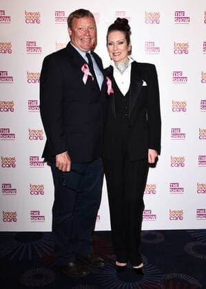 The Breast Cancer Care Fashion Show 2015 London, UK. Ricky Groves and Lorraine Chase at The Breast Cancer Care Fashion Show at Grosvenor House, Park Lane, London on Wednesday 7 October 2015. LMK392 -58339-081015 
