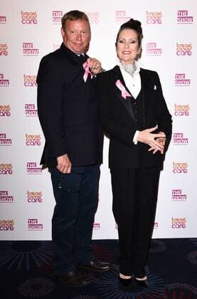 The Breast Cancer Care Fashion Show 2015 London, UK. Ricky Groves and Lorraine Chase at The Breast Cancer Care Fashion Show at Grosvenor House, Park Lane, London on Wednesday 7 October 2015. LMK392 -58339-081015 