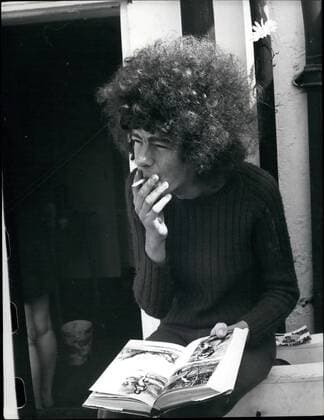 Feb. 24, 1972 - The House Where They Live: In a terraced house in Dalston, near where the British fascists, once held away, permanent members of the new cult of the Flower People a branch of the hippy cult, and members of a group going under the name of The Electric Galaxy, have their London pad . Living with them there, enjoying a freedom seldom to be experience elsewhere but being a nuisance to no one and enjoying mutual happiness and peace, is Philippine sculptor David Madella, a Cambridge undergraduate, young men and women from the cult in the USA and others. Our photographer was permitted to stay the night and a morning there and recorded the mode of life of some of the regular members of a movements that is causing the capital once again to wonder and say Where, or What Next!. Young men,, serious of mind, bookish type but perhaps a trifle unorthodox in taste. The symbolic fl - ZUMAk09_