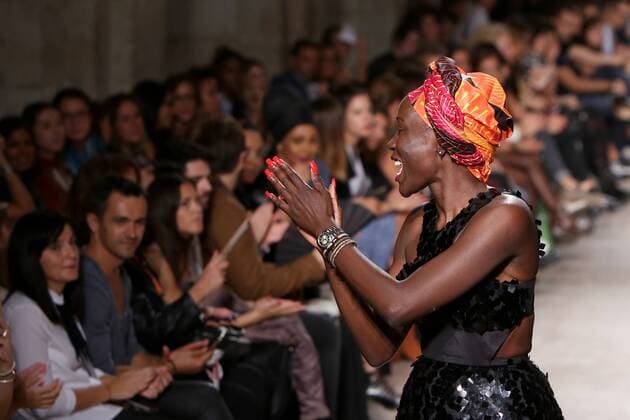 Oct. 11, 2015 - Lisbon, Portugal - The Angolan fashion designer Nadir Tati acknowledges cheers after presenting the Spring Summer 2016 creations during Lisbon Fashion Week - Moda Lisboa The Timers at the Patio da Gale on Terreiro do Paco Square in Lisbon on October 11, 2015. Lisbon Portugal  - ZUMAn230