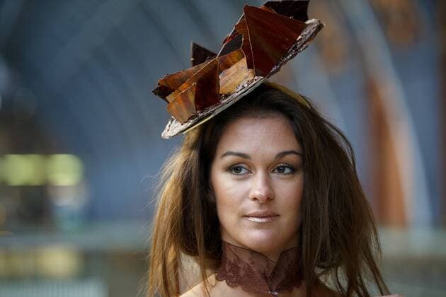 Oct. 12, 2015 - London, London, UK - London, UK. Models dressed in clothing made entirely from chocolate showcasing The Chocolate Show s fashion collection at St Pancras International station on Monday, 12 October, 2015. London UK  - ZUMAl94_
