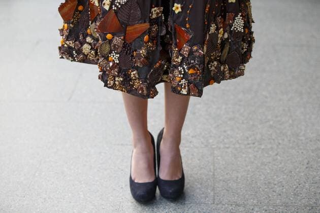 Oct. 12, 2015 - London, London, UK - London, UK. Models dressed in clothing made entirely from chocolate showcasing The Chocolate Show s fashion collection at St Pancras International station on Monday, 12 October, 2015. London UK  - ZUMAl94_