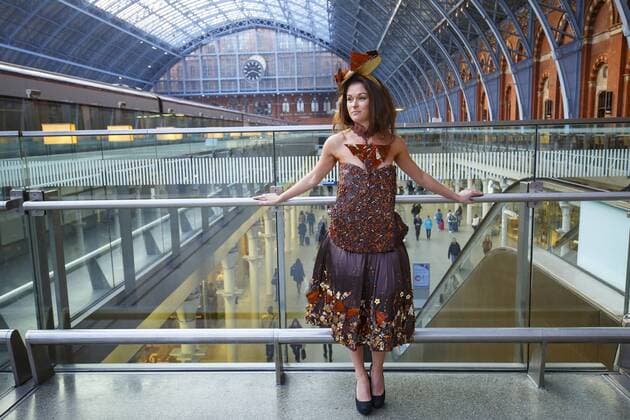 Oct. 12, 2015 - London, London, UK - London, UK. Models dressed in clothing made entirely from chocolate showcasing The Chocolate Show s fashion collection at St Pancras International station on Monday, 12 October, 2015. London UK  - ZUMAl94_