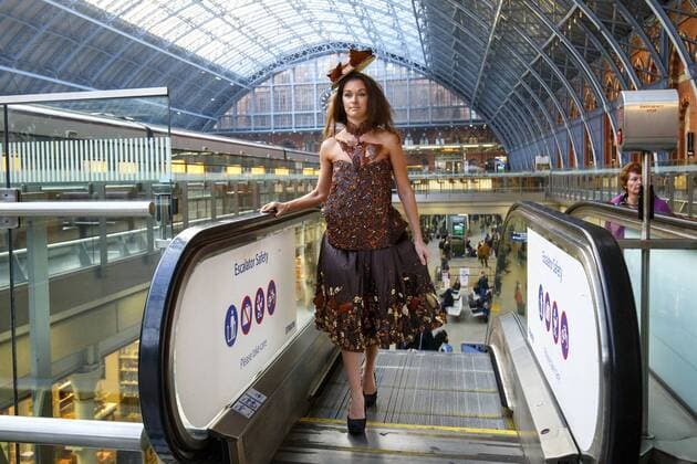 Oct. 12, 2015 - London, London, UK - London, UK. Models dressed in clothing made entirely from chocolate showcasing The Chocolate Show s fashion collection at St Pancras International station on Monday, 12 October, 2015. London UK  - ZUMAl94_
