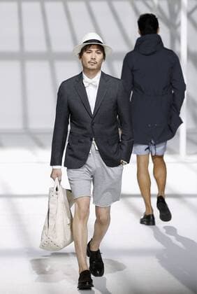 Fashion Week Tokyo Models wearing outfits of TODD SNYDER walk on a runway in Tokyo s Shibuya district as Fashion Week Tokyo begins Oct. 12, 2015. 