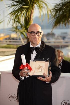 May 24, 2014 - Cannes, France - CANNES, FRANCE - MAY 24: creenwriter Bruce Wagner poses with the Best Actress Prize after receiving the award on behalf of actress Julianne Moore as he attends the Palme D Or Winners photocall during the 67th Annual Cannes Film Festival on May 24, 2014 in Cannes, France. - ZUMAi09