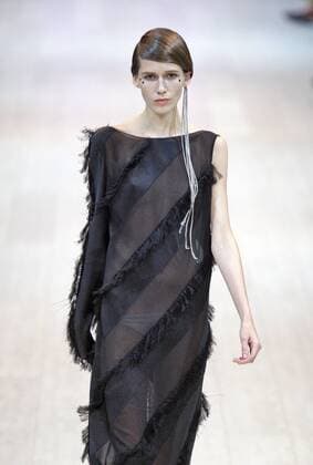 A model presents a creation by Ukrainian designer Andre Tan during the Ukrainian Fashion Week in Kiev on October 16, 2015.  KIE2015101605 IVANxVAKOLENKO