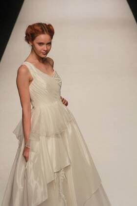 (151017) -- SHANGHAI, Oct. 17, 2015 -- A model presents a creation of brand Galatea Bridal during the Shanghai Fashion Week in east China s Shanghai, Oct. 17, 2015. About 50 fashion shows would be held during the fashion week. ) (yxb) CHINA-SHANGHAI-FASHION WEEK(CN) ZhuangxYi 