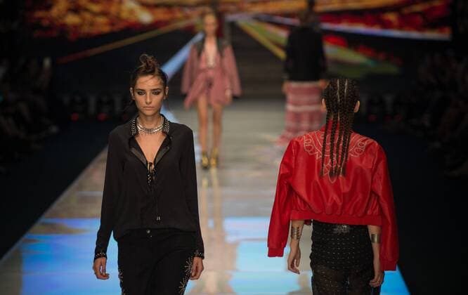Models present creations of Dodo Bar Or during Gindi Tel Aviv Fashion Week in Tel Aviv, Israel, on Oct. 21, 2015. The four-day Gindi Tel Aviv Fashion Week ended here on Wednesday. ) ISRAEL-TEL AVIV-FASHION WEEK LixRui 