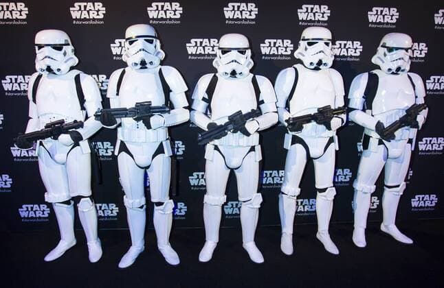 (151022) -- TORONTO, - Star Wars stormtroopers pose for photos during the Star Wars Presentation of the the World MasterCard Toronto Fashion Week Spring Sumer 2016 at David Pecaut Square in Toronto, Canada, Oct. 21, 2015. Zou Zheng) CANADA-TORONTO-FASHION WEEK-STAR WARS yanzhonghua 