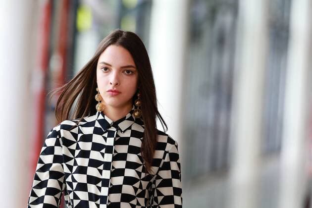 Oct. 21, 2015 - Sao Paulo, Brazil - A model presents the creation of Reinaldo LourenÃßo during the 2016 Winter collection of the Sao Paulo Fashion Week. Sao Paulo Brazil - ZUMAp133