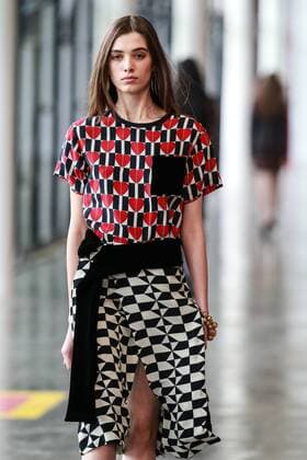 Oct. 21, 2015 - Sao Paulo, Brazil - A model presents the creation of Reinaldo LourenÃßo during the 2016 Winter collection of the Sao Paulo Fashion Week. Sao Paulo Brazil - ZUMAp133