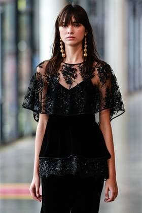 Oct. 21, 2015 - Sao Paulo, Brazil - A model presents the creation of Reinaldo LourenÃßo during the 2016 Winter collection of the Sao Paulo Fashion Week. Sao Paulo Brazil - ZUMAp133