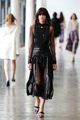 Oct. 21, 2015 - Sao Paulo, Brazil - A model presents the creation of Reinaldo LourenÃßo during the 2016 Winter collection of the Sao Paulo Fashion Week. Sao Paulo Brazil - ZUMAp133