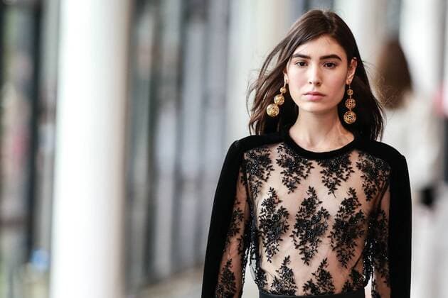 Oct. 21, 2015 - Sao Paulo, Brazil - A model presents the creation of Reinaldo LourenÃßo during the 2016 Winter collection of the Sao Paulo Fashion Week. Sao Paulo Brazil - ZUMAp133