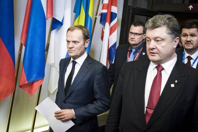 Feb. 12, 2015 - Brussels, Bxl, Belgium - Ukraine s President Petro Poroshenko (R) and Donald Tusk , the president of the European Council hold a press conference during the European Summit of Heads of States and governments at the EU Council headquarters in Brussels, Belgium on 12.02.2015 The EU summit started two hours later than planned, after two of its participants - German Chancellor Angela Merkel and French President Francois Hollande - spent all night negotiating a Ukraine truce deal in Minsk. The European Union leaders are meeting to discuss Greece s economic crisis, EU counterterrorism efforts and the situation in Ukraine. by Wiktor Dabkowski - ZUMAw80