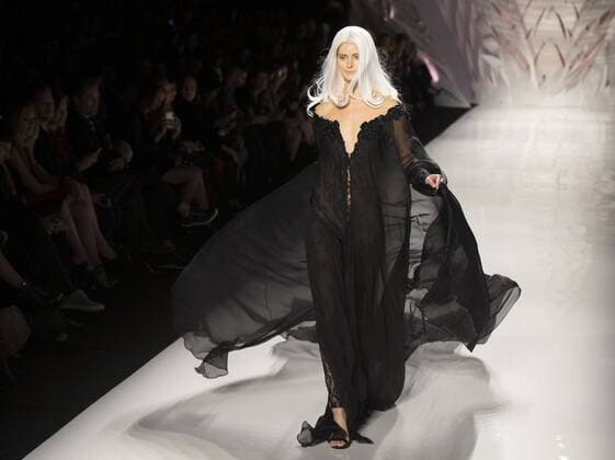 A model walks the runway wearing Mikael D SS 2016 collection during the World MasterCard Toronto Fashion Week Spring Summer 2016 at David Pecaut Square in Toronto, Canada, Oct. 23, 2015. ) CANADA-TORONTO-FASHION WEEK ZouxZheng 