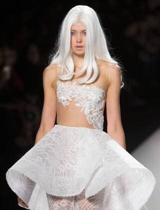 A model walks the runway wearing Mikael D SS 2016 collection during the World MasterCard Toronto Fashion Week Spring Summer 2016 at David Pecaut Square in Toronto, Canada, Oct. 23, 2015. ) CANADA-TORONTO-FASHION WEEK ZouxZheng 