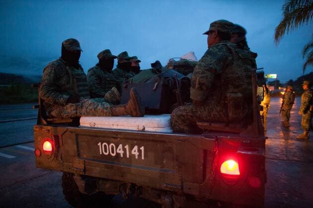Mexican soldiers travel on Mascota-Puerto Vallarta Road during Hurricane Patricia in El Refugio town, Jalisco State, western Mexico, on Oct. 24, 2015. The National Meteorological Service of Mexico reported Saturday that Hurricane Patricia has degraded to a tropical storm. and San Luis Potosi, and strong in Chihuahua and Queretaro. Pedro Mera) (jg) (vf) MEXICO-JALISCO-HURRICANE-DEGRADE e PedroxMera 