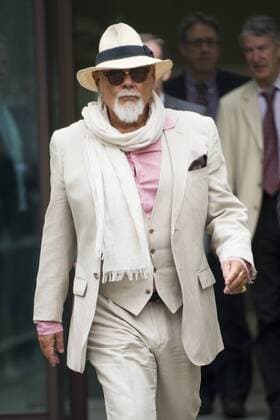 June 19, 2014 - London, London, UK - London, UK. Former glam rock star Gary Glitter, real name Paul Gadd, leaving Westminster Magistrates Court in London where he faced charges of eight alleged sex offences against two girls aged 12 and 14. Glitter already has criminal convictions for possession of child pornography. Photo credit : Ben Cawthra LNP  - ZUMAl94
