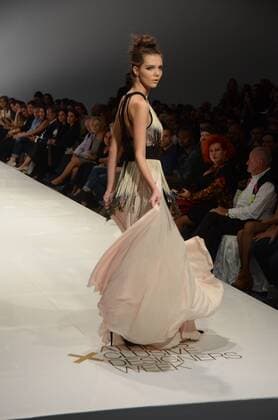 Oct. 24, 2015 - Athens, Greece - A model wears a creation of Tassos Mitropoulos fashion designer. Fashion designers present their creations as part of 2nd Day of the 18th Athens Xclusive Designers Week fashion event in Athens. Athens Greece - ZUMAp133