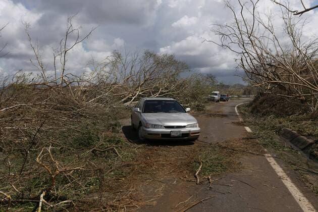 Oct. 24, 2015 - Mexico - A car crossing a blocked road in the coast of the Jalisco state of Mexico beacuase hurricane Patricia. Hurricane Patricia the strongest hurricane ever recorded made landfall on Friday without causing the catastrophic damage that many had anticipated. That lack of destruction is in large part due to the storm™s record winds staying confined to a small area and hitting a relatively unpopulated region. Mexico - ZUMAp133