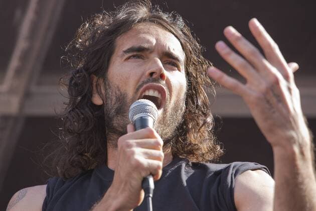June 21, 2014 - London, England, United Kingdom - Actor and political campaigner RUSSELL BRAND speaks at the No More Austerity demonstration and festival in Parliament Square.  - ZUMAl94