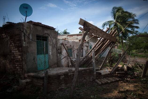 View of a house after the passage of hurricane Patricia, in La Huerta, Jalisco state, Mexico, on Oct. 24, 2015. Several municipalities in the western Mexican state Jalisco on the Pacific coast on Saturday were still on alert as Hurricane Patricia lashed further inland and weakened to a tropical storm. Pedro Mera) (da) (fnc) MEXICO-LA HUERTA-ENVIRONMENT-HURRICANE e PEDROxMERA 