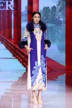 BEIJING, CHINA - OCTOBER 25: (CHINA OUT) A model showcases designs on the runway at NE-TIGER Haute Couture Collection during the Mercedes-Benz China Fashion Week S S 2016 at Beijing Hotel on October 25, 2015 in Beijing, China.  CFP474868171