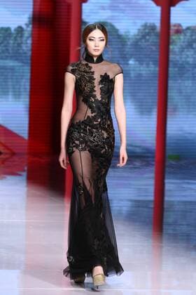 BEIJING, CHINA - OCTOBER 25: (CHINA OUT) A model showcases designs on the runway at NE-TIGER Haute Couture Collection during the Mercedes-Benz China Fashion Week S S 2016 at Beijing Hotel on October 25, 2015 in Beijing, China.  CFP474868197