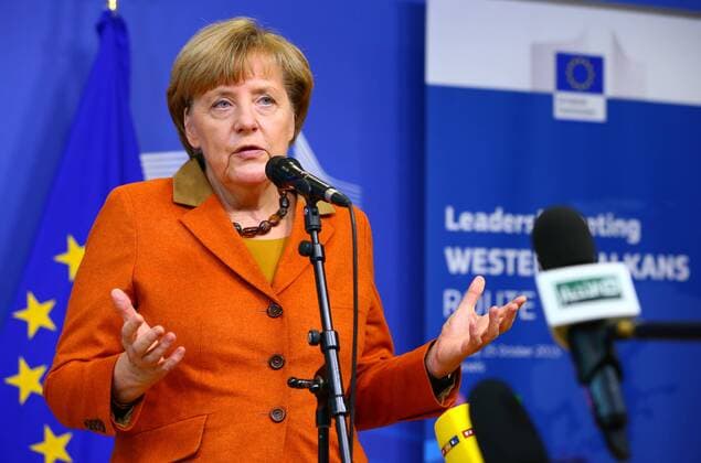 (151025) -- BRUSSELS, Oct. 25, 2015 -- German Chancellor Angela Merkel speaks to the press while arriving to attend the Leaders Meeting on refugee flows along the Western Balkans route in Brussels, Belgium, on Oct. 25, 2015. ) BELGIUM-LEADERS MEETING-WESTERN BALKANS ROUTE GongxBing 