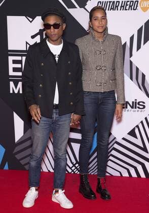 Pharrell Williams and his wife Helen Lasichanh arrive at the MTV Europe Music Awards in Milan, Italy on October 25, 2015.  MIL20151025723 DAVIDxSILPA