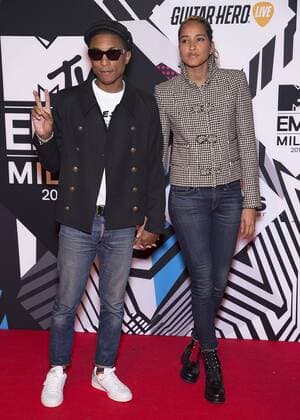 Pharrell Williams and his wife Helen Lasichanh arrive at the MTV Europe Music Awards in Milan, Italy on October 25, 2015.  MIL20151025725 DAVIDxSILPA