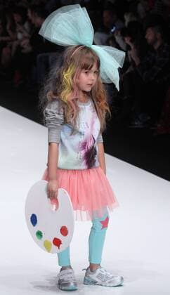 MOSCOW, RUSSIA. OCTOBER 26, 2015. A young model wears a creation for 2016 spring summer Detsky Mir collection on the closing day of the 2015 Mercedes Benz Fashion Week Russia at Manege Central Exhibition Hall. Sergei Vinogradov TASS  TS01097A