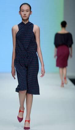 A model displays the creation by Greek designer Angelos Bratis during the China Fashion Week S S 2016 in Beijing, China, Oct. 26, 2015. ) (zhs) CHINA-BEIJING-FASHION WEEK-ANGELOS BRATIS (CN) ChenxJianli 