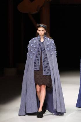 BEIJING, CHINA - OCTOBER 26: (CHINA OUT) A model showcases designs on the runway at Qing s Zheng Qinger Collection during the Mercedes-Benz China Fashion Week Spring Summer 2016 at Beijing Hotel on October 26, 2015 in Beijing, China.  CFP474944480