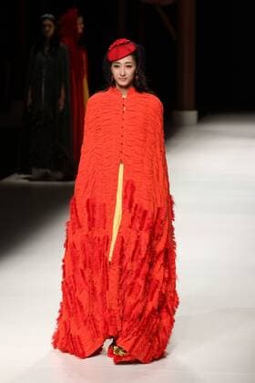 BEIJING, CHINA - OCTOBER 26: (CHINA OUT) A model showcases designs on the runway at Qing s Zheng Qinger Collection during the Mercedes-Benz China Fashion Week Spring Summer 2016 at Beijing Hotel on October 26, 2015 in Beijing, China.  CFP474944487