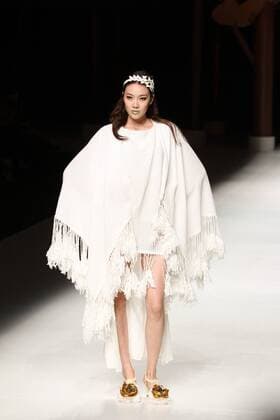 BEIJING, CHINA - OCTOBER 26: (CHINA OUT) A model showcases designs on the runway at Qing s Zheng Qinger Collection during the Mercedes-Benz China Fashion Week Spring Summer 2016 at Beijing Hotel on October 26, 2015 in Beijing, China.  CFP474944502